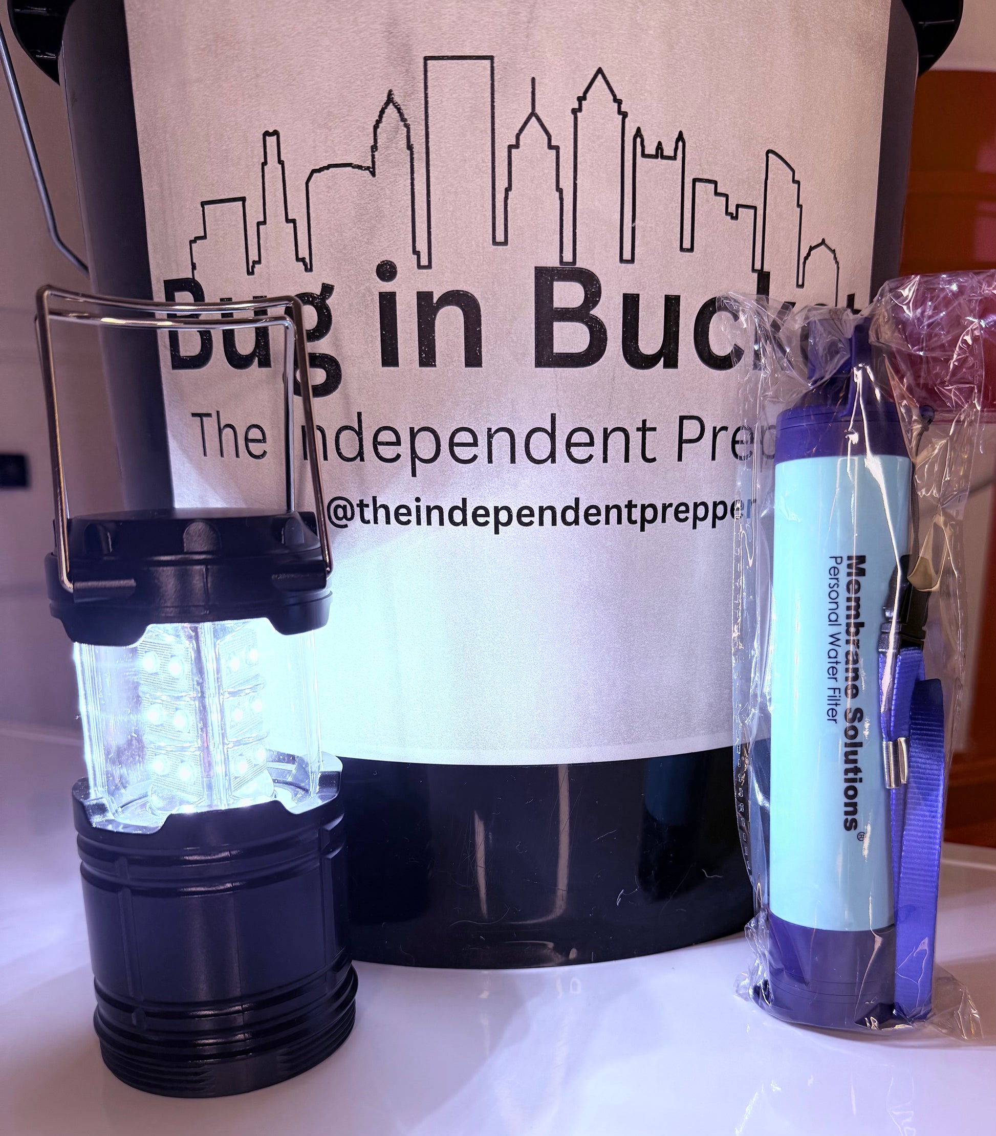 (Black Bucket) All you need in one bucket, that also becomes the Temporary toilet. 