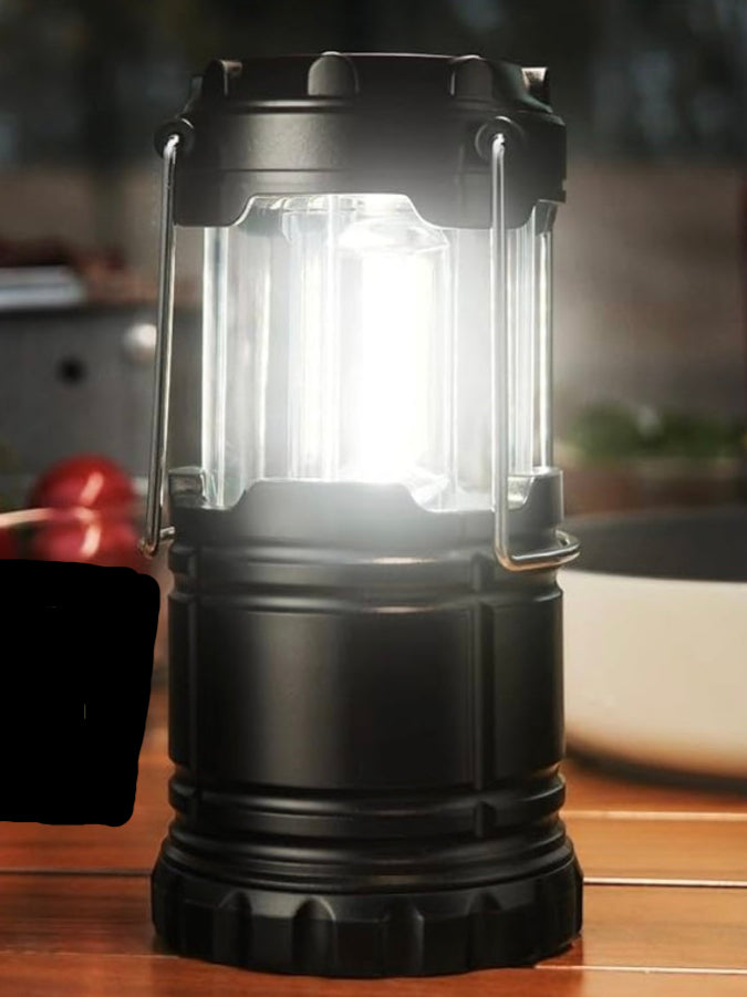 Collapsible compact lantern included. Provides bright light, runs on 3 AAA batteries included. 